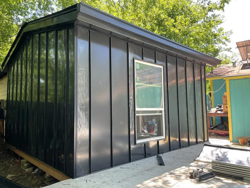 Black standing seam metal wall panels for Metal Roof Installation in Natchitoches