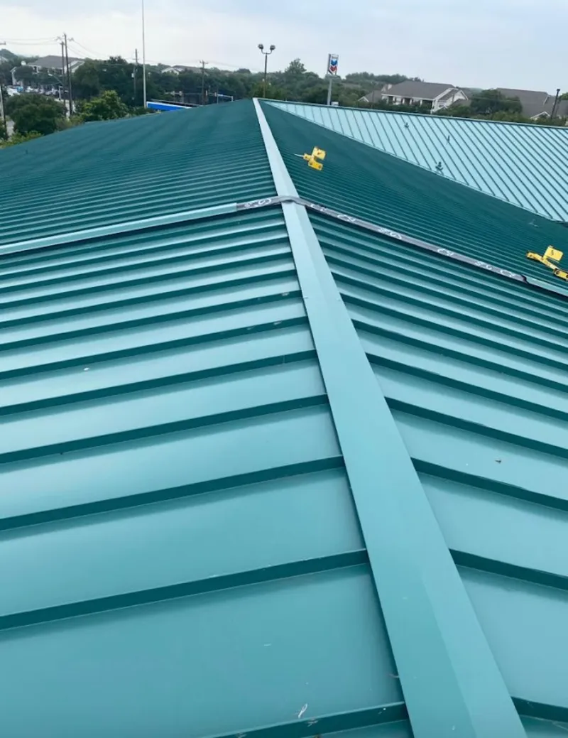 Green commercial metal roof ridge and valley for Metal Roof Repair in Natchitoches